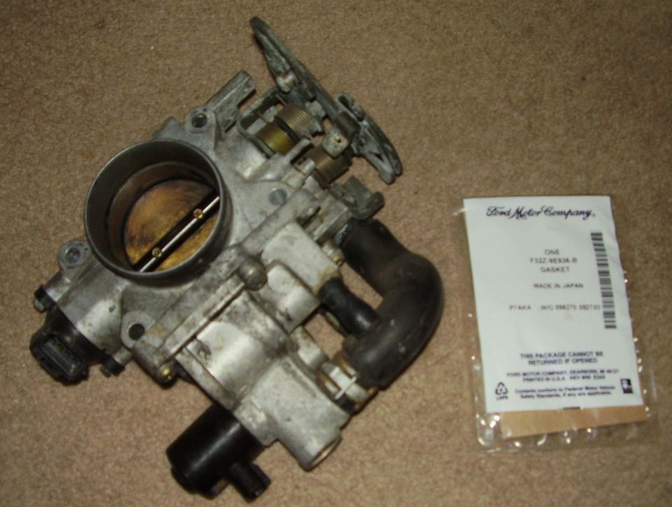 KLDE Throttle Body and New OEM Gasket , front view