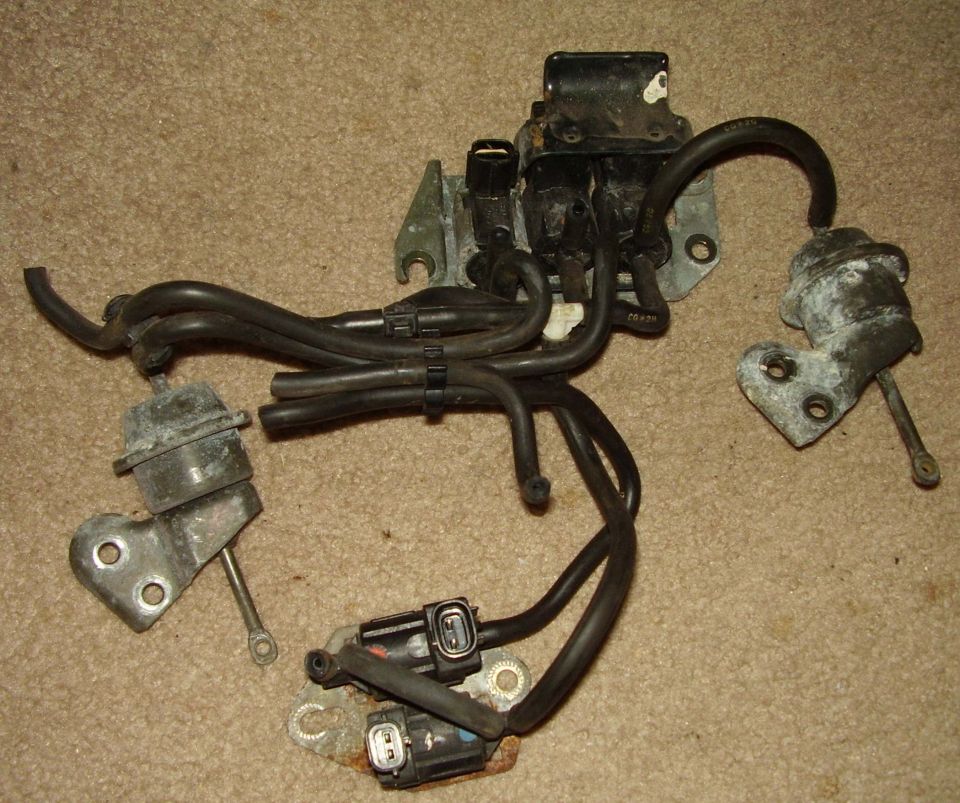 Vacuum system showing:
- VRIS #1 and 2 actuators
- VRIS #1 and 2 solenoids
- EGR Vent Solenoid
- EGR Purge Solenoid
- EGR Vacuum Solenoid
- some intact vacuum hoses
- IM solenoid/actuator mounting brackets