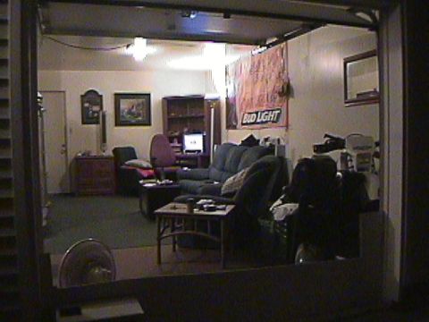 1994 Ford Bronco - Living room scene with furniture, a TV, and a Bud Light banner.