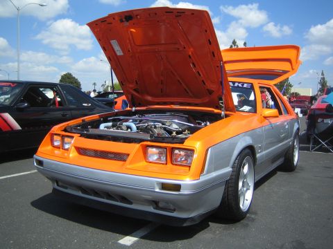 1968 Ford Mustang - Customized Ford Mustang on display at an outdoor car show.