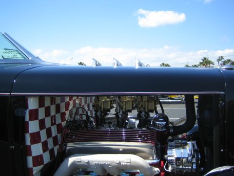 1968 Ford Mustang - Custom hot rod engine multiple carburetors and a unique checkered interior.