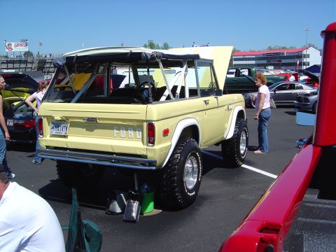 1986 Ford Bronco - This classic Ford Bronco is on display at an outdoor car show with its top off.