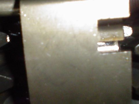 1981 Ford Bronco - Detail of a metal part, likely from machinery or a vehicle component.