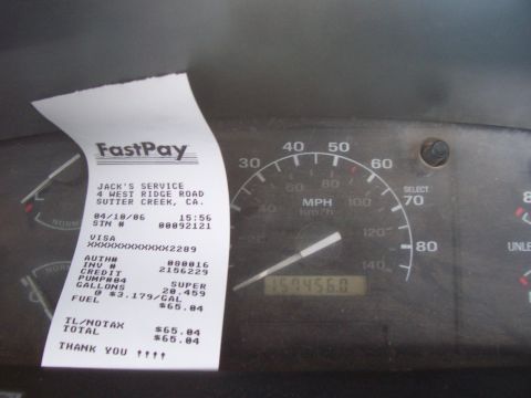 1994 Ford F-150 - A FastPay receipt from Jack's Service in Sutter Creek, CA laid over a truck's gauge cluster, recording 20.459 gallons of Super at $3.179/ga…
