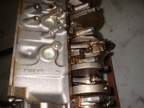 1971 Ford Mustang - Close-up view of an engine block and crankshaft assembly, showing internal engine components.