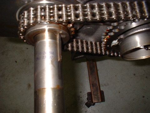 1971 Ford Mustang - Close-up view of an engine's timing chain and gears, showing a date stamp of 10/24/94.