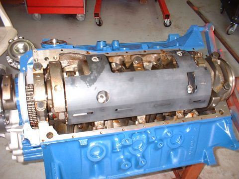1971 Ford Mustang - This is a close-up view of an engine block with the crankshaft visible, undergoing some form of repair or assembly.