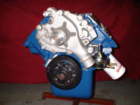 1971 Ford Mustang - Ford V8 engine block with Weiand water pump and oil filter, mounted on a stand.