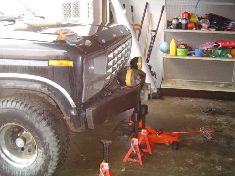 1995 Ford Bronco - Bumper partially mounted to mark bolt holes for drilling