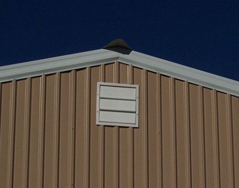 1986 Ford Ranger - Exterior of a metal building with a vent under a clear blue sky. A website watermark is visible at the bottom.