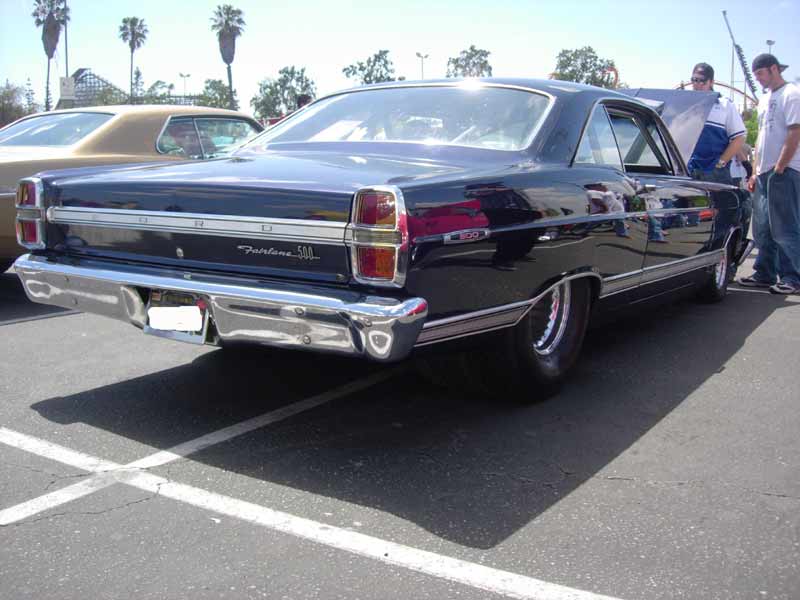 Dark blue 1967 Ford Fairlane 500 sedan, rear three-quarter view