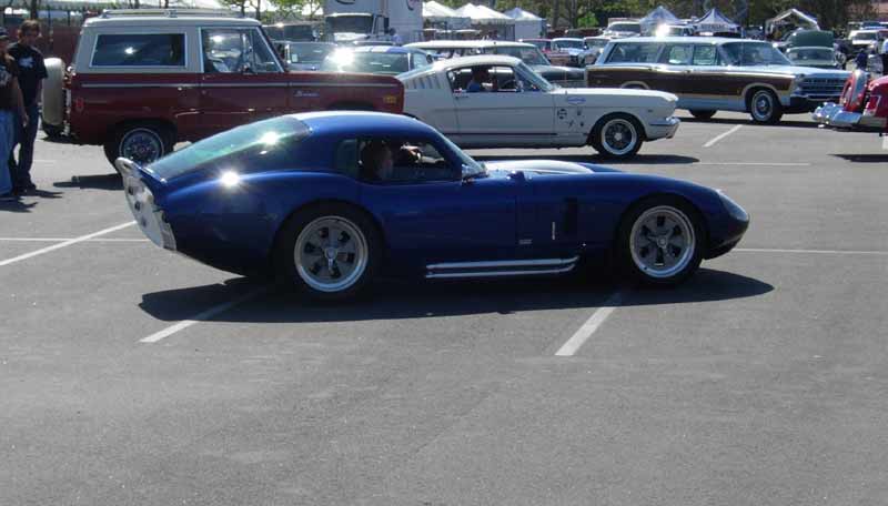 Blue Shelby Daytona Coupe replica in profile at car-show lot