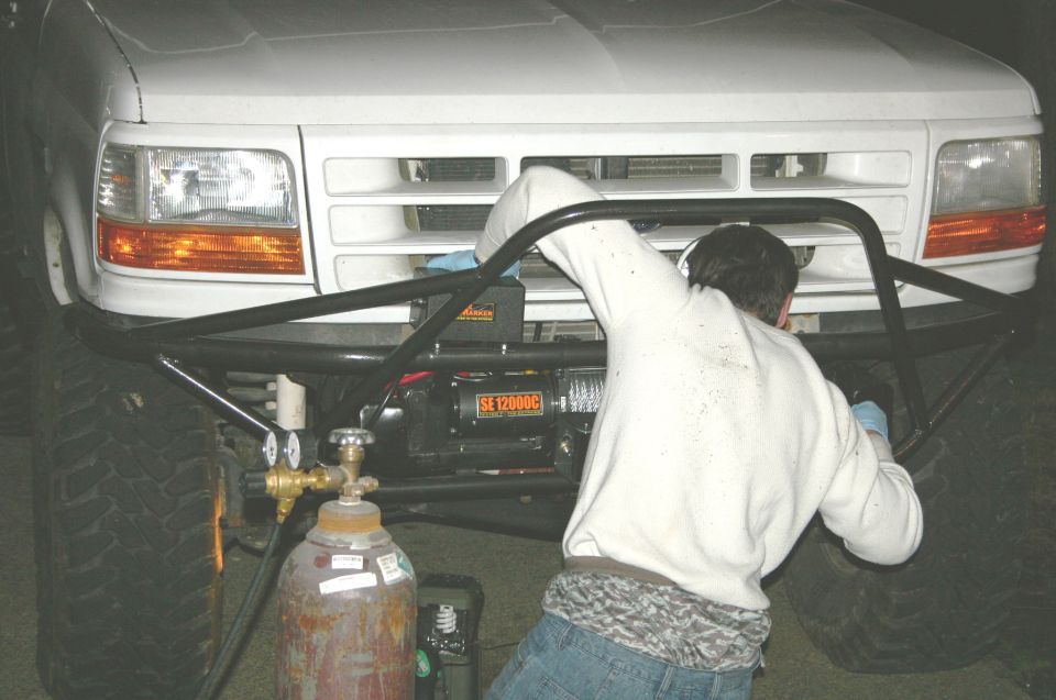 1995 Ford Bronco front end with custom bumper, winch, and welding equipment