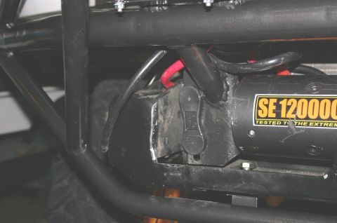 1995 Ford Bronco - A winch with a capacity of 120000 is attached to the vehicle's frame, with visible wiring and structural components.