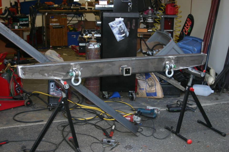 Custom rear bumper with tow hitch and D-rings
