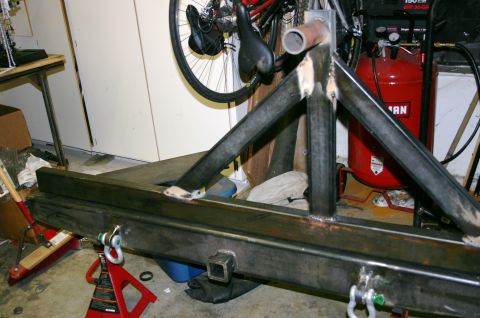 1995 Ford Bronco - Custom fabricated rear bumper and tire carrier assembly, a hitch receiver and robust steel construction.