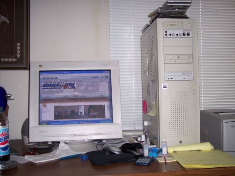 1972 Ford Ranchero - A computer monitor displays a website with the word RANCHERO prominently featured on its homepage.