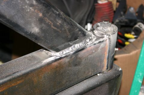 1995 Ford Bronco - Detail of a welded metal component, possibly from a vehicle's frame or bumper assembly.