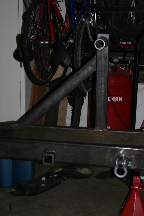 1995 Ford Bronco - Custom metal fabrication project with bicycles and an air compressor visible in the background.