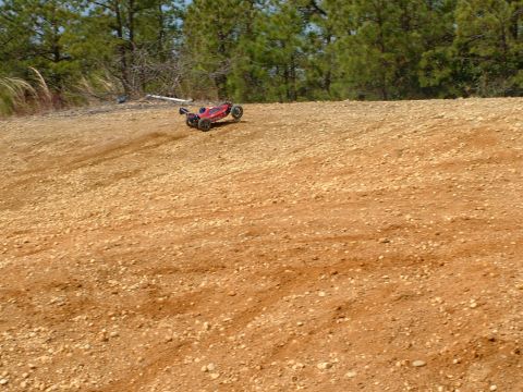 1994 Ford Bronco - A remote control car navigates a dusty, outdoor terrain.