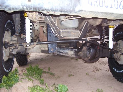 1994 Ford Bronco - Close-up of the undercarriage of a 1994 Ford Bronco with a lift kit installed.