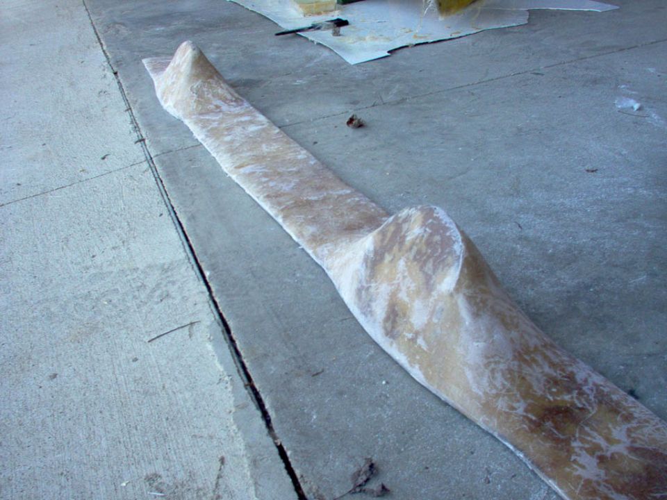 polyester and fiberglass layed down and dried