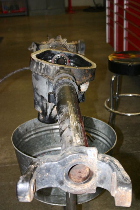 1995 Ford Bronco - This is a disassembled front axle differential housing, likely undergoing maintenance or repair.