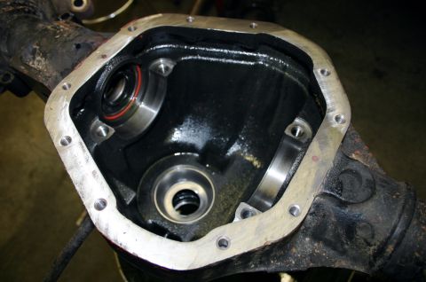 1995 Ford Bronco - Close-up of a differential housing with bearing races, ready for a new gasket.