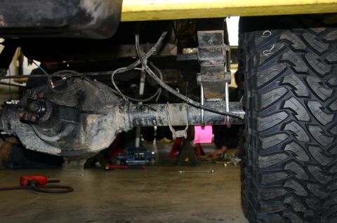 1995 Ford Bronco - Rear axle and suspension components of a vehicle are shown in detail.