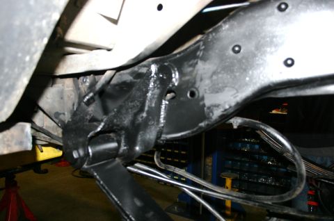 1995 Ford Bronco - Close-up of vehicle frame and suspension components, with Supermotors.net logo in the corner.