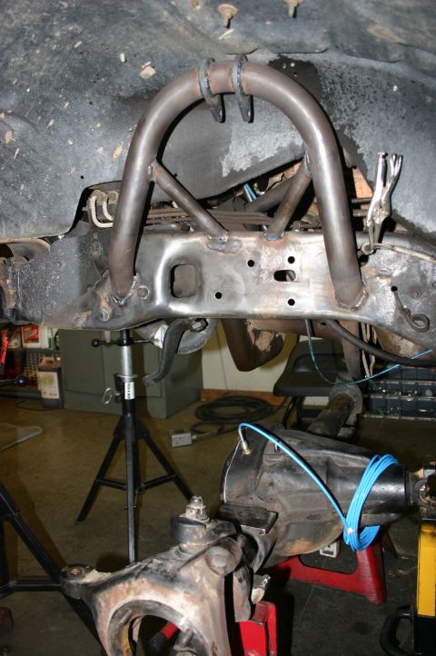 1995 Ford Bronco - Custom suspension modification with welded bracing and suspension components.