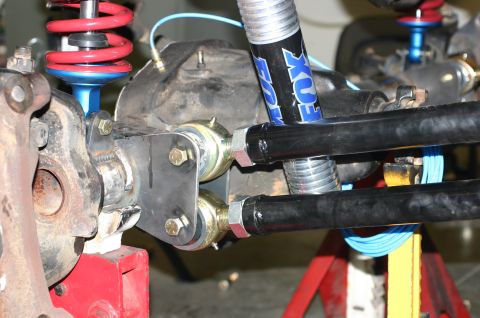 1995 Ford Bronco - Custom suspension modifications are visible on the rear axle, Fox shocks and adjustable control arms.