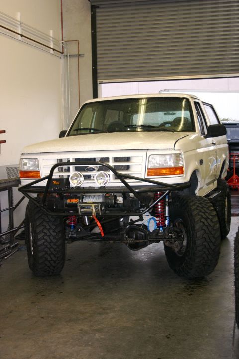 1995 Ford Bronco - Modified 1995 Ford Bronco a custom front bumper, winch, and lifted suspension.