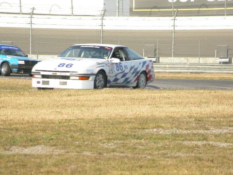 1990 Ford Probe - Try to fend off a pesky IT car.