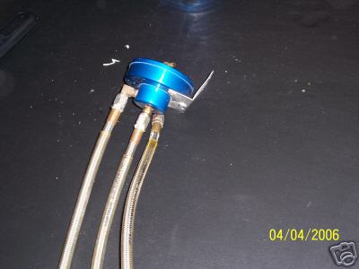 1994 Ford Probe - A blue fuel pressure regulator with braided hoses is shown, with a date stamp of 04/04/2006 and Supermotors.net watermark.