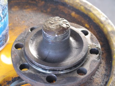 1993 Ford C-350 (Centurion Conversions) - The spindle on this wheel hub appears to be severely damaged and worn.