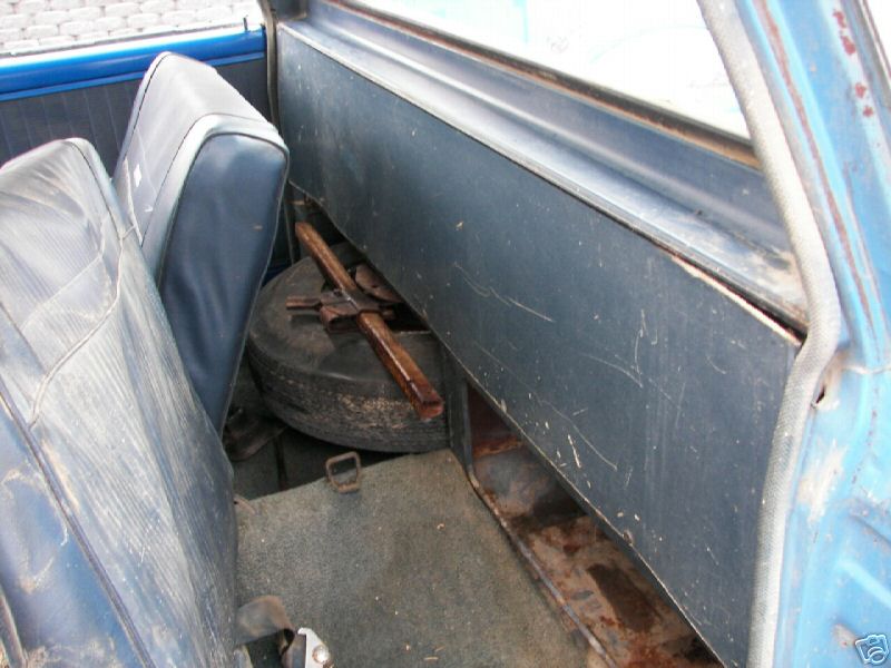Behind the drivers seat