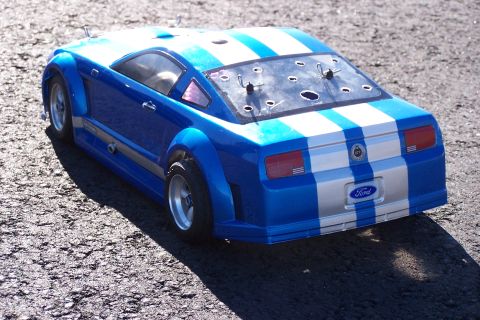 1994 Ford Bronco - This remote control car has a Ford logo and racing stripes.