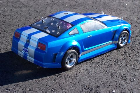 1994 Ford Bronco - This remote-controlled car has racing stripes and a Ford emblem on the rear.