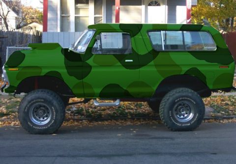 1978 Ford Bronco - This 1978 Ford Bronco features a distinctive camouflage paint job and is modified with a lift kit.