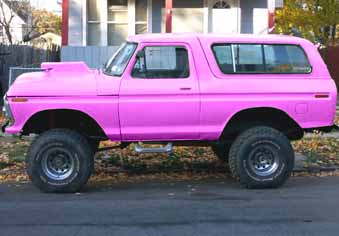 1978 Ford Bronco - 1978 Ford Bronco modified with a hood scoop and large off-road tires.