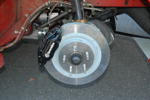 1993 Ford Mustang - A close-up view of a vehicle's braking system, a Brembo caliper and rotor.