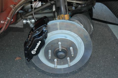 1993 Ford Mustang - Close-up of a performance brake system, showing a Brembo caliper and rotor.