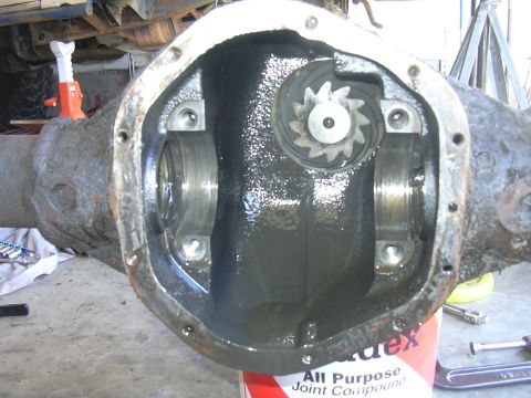 1991 Ford Bronco - Close-up of an open differential housing, showing internal gears and bearings.