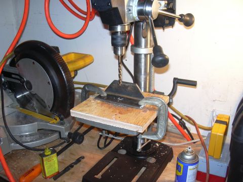 1991 Ford Bronco - A workshop scene shows a drill press and miter saw with various tools and supplies.