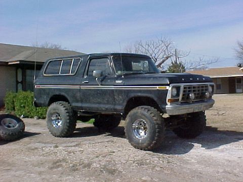 1978 Ford Bronco - This lifted 1978 Ford Bronco features a distinctive grille and off-road tires, ready for adventure.
