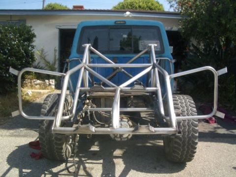 2002 Ford Ranger - Custom roll cage fitted to the rear of a blue pickup truck, possibly a 2002 Ford Ranger.