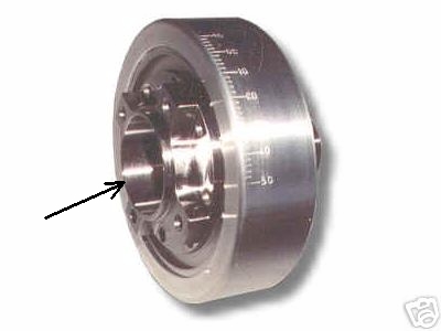 1990 Ford Mustang - Crankshaft pulley with timing marks, likely for an engine rebuild or performance upgrade.