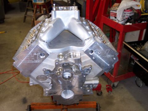 1972 Ford Ranchero - An aluminum V8 engine block, likely a performance part, is shown on an engine stand.