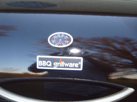 1988 Ford Bronco - Close-up of a BBQ grillware thermometer and handle.